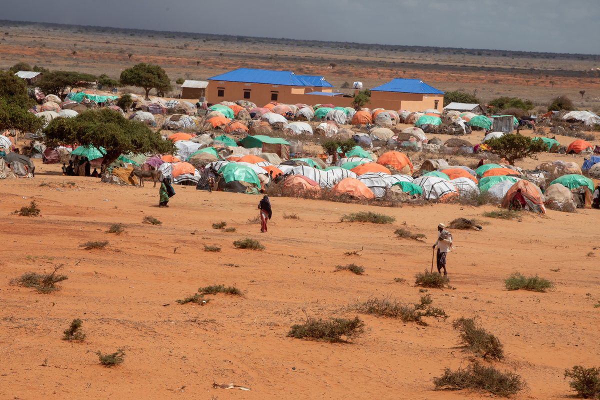 A landscape shot shows an aerial view of Eljale, a camp for internally displaced people (IDP) in Kismayo, Somalia, on 20 April 2022. WHO Somalia continues to collaborate with key partners to provide support to the Federal and State Ministries of Health in Somalia to offer COVID-19 vaccinations to eligible Somalis, wherever they live. Immunizing newly displaced persons from drought, some of parents didn’t seen an immunization program more than 10 years due to the accessibility or insecurity.