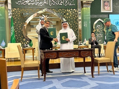 The World Health Organization (WHO) and the King Salman Humanitarian Aid and Relief Centre (KSrelief) signed a letter of intent to solidify their commitment to collaborative humanitarian efforts in the Gaza Strip. The letter of intent, for US$ 10 million, was signed by Dr Ahmed Al-Mandhari, WHO Regional Director for the Eastern Mediterranean, and His Excellency Dr Abdullah Al Rabeeah, Supervisor General of KSrelief. The document reflects the continued shared vision and dedication of both organizations to address urgent health needs of people in the Region. The support funded by KSrelief will be aligned with WHO’s operational plan for the occupied Palestinian territory, with a focus on ensuring the availability of life-saving medical supplies and equipment in the Gaza Strip, as well as fuel availability. As deaths and injuries in the Gaza Strip continue to rise, this support will allow WHO to procure additional life-saving trauma supplies for delivery to health facilities in the Gaza Strip as soon as access is possible. Intense overcrowding and disrupted health, water and sanitation systems are contributing to the rapid spread of infectious diseases, which also demand an urgent scaled-up response. Fuel is also urgently needed, to power the delivery of essential service at health facilities as well as ambulance services. This response, however, is dependent on the unimpeded delivery of safe water, food, fuel and other humanitarian aid to health facilities, so that they can function and provide the life-saving health services that are desperately needed. KSrelief is a long-standing partner of WHO, working to preserve health systems and facilitating the provision of life-saving services and supplies in emergency-affected countries and territories across the Region and beyond. Since 2016, WHO and KSrelief have collaborated on multiple health projects in emergency settings at a total cost of more than US$ 300 million. - Title of WHO staff and officials reflects their respective position at the time the photo was taken.