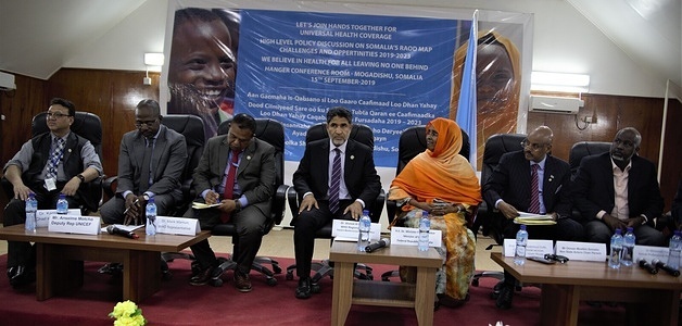 A high level policy dialogue event attended by Dr Fawziya Abikar Nur (center right), Minister for Health for Somalia, Dr Ahmed Al-Mandhari (center), WHO Regional Director for the Eastern Mediterranean, Dr Sk Md Mamunur Rahman Malik (center left), WHO Representative for Somalia, ministers, parliamentarians and United Nations (UN) partners. Participants noted that Universal Health Coverage (UHC) in Somalia was an ambitious but achievable goal requiring political will, health leadership, strong coordination, and sustained donor support. - Title of WHO staff and officials reflects their respective position at the time the photo was taken.