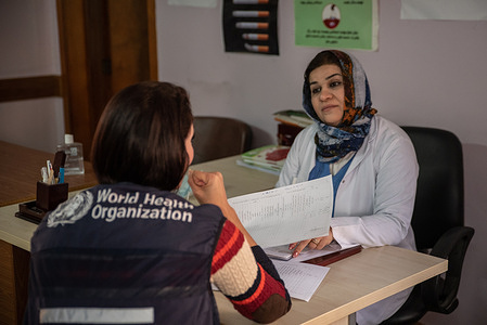 Gender-based (GBV) Technical officer from World Health Organization (WHO), discusses counseling methods and youth programs with GBV and PSS service provider at Nafih Akrayi primary health care center. Erbil, Iraq. The World Health Organization (WHO), together with the Ministry of Health, initiated implementation of a technical referral guideline for gender-based violence (GBV) survivors in Iraq. The guideline was developed earlier in collaboration with relevant line-ministries, organizations and other partners.   https://www.emro.who.int/iraq/news/who-and-ministry-of-health-initiate-implementation-of-gbv-referral-guideline-in-iraq.html