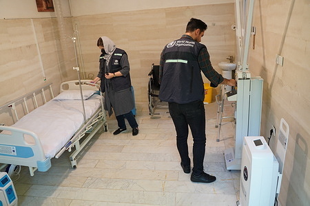 Marking the success of about 2 years of hard work, WHO and project partners celebrated the opening of a standard isolation room in a select long-term care facility in Pakdasht, Tehran. The isolation room at this facility and numerous other facilities across the country have been set up as part of the project “Improving access to inclusive health care services for the elderly and people living with disabilities during COVID-19 in Islamic Republic of Iran,” co-funded by WHO, the European Union (ECHO), and the Government of Canada.   During the official launching ceremony, held at “Pedarbozorg” long-term care facility, Mr Stefan Priesner, the United Nations Resident Coordinator, Dr Syed Jaffar Hussain, WHO Representative in Islamic Republic of Iran, Mr Mohsen Ardestani, the Governor of Pakdasht County, Ms Farideh Baghalishahi, the Drector of Rehabilitation and Care Department of the State Welfare Oraganization, and members of the project steering committee discussed the achievements and renewed interest for further collaborations. Dr Rahim Taghizadeh, Team Lead of the Healthier Population Unit, acknowledged the efforts of the State Welfare Organization, the Ministry of Health and Medical Education, and the project team in achieving:  distribution of 1000 assistive technologies to 961 prioritized recipients across 15 provinces in the country, focusing on low-income households and people with severe disabilities;  provision of access to standard isolation rooms in long-term care facilities for over 7000 persons across in 13 provinces; and provision of access to quality care to 12 500 older people and people living with disabilities by training about 150 experts, personnel, and service providers over the course of the project. The ceremony concluded with participants visiting the isolation room and laundry facility set up during the project. https://www.emro.who.int/iran/news/who-and-un-resident-coordinators-office-together-with-implementing-partners-open-standard-isolation-room-under-echo-co-funded-project.html   - Title of WHO staff and officials reflects their respective position at the time the photo was taken.