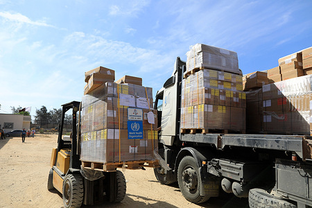 Four trucks carrying WHO health supplies have started to move towards the Rafah border crossing, on their way to Gaza. The supplies include trauma medicines and supplies for 1200 people and 235 portable trauma bags for on-the-spot stabilization of injured patients. They also include medicines for the treatment of chronic diseases for 1500 people, and basic essential medicines and health supplies for 300,000 people for three months. WHO is working with the Egyptian and Palestine Red Crescent societies to ensure the safe passage of these critical supplies and their delivery to hospitals and health facilities. Inside Gaza, hospitals have already reached breaking point due to shortages and depletion of medicines and medical supplies. These supplies are a lifeline for severely injured people or those battling chronic and other illnesses, who have endured a harrowing two weeks of limited access to care and severe shortages of medicines and medical supplies. WHO calls for the protection of aid convoys and humanitarian teams in Gaza as they work to ensure the safe delivery of these supplies to where they are most needed. The supplies currently heading into Gaza will barely begin to address the escalating health needs as hostilities continue to grow. A scaled up and protected aid operation is desperately needed A second plane landed in Al-Arish from the United Arab Emirates yesterday carrying humanitarian supplies donated by IOM, UNICEF, the Emirati Red Crescent, and WHO. WHO supplies include surgical instruments and equipment for 1000 people, as well as tents and water tanks. Another plane carrying WHO supplies is due to land in Al-Arish later this morning. WHO supplies on these flights include medicines, surgical supplies and instruments, infusions, disinfectant, antibiotics, water tanks, and tents. With more supplies for Gaza expected to land in Egypt over the coming days, WHO calls for a scaled up, sustained and protected humanitarian operation to prevent avoidable deaths and to reduce avoidable suffering.