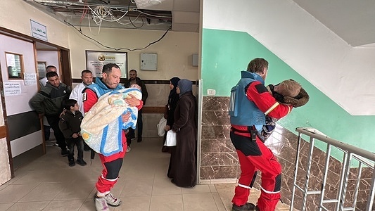 WHO team evacuating two six-year-old patients from Kamal Adwan hospital in Gaza to receive care abroad. One child has cystic fibrosis, the other has leukemia. Two caregivers were evacuated with them.